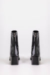 Zip back fastening boots
