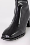 Zip back fastening boots