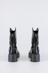 Zip back fastening boots