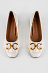 Heeled loafers with chain
