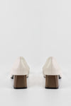Heeled loafers with chain