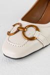 Heeled loafers with chain