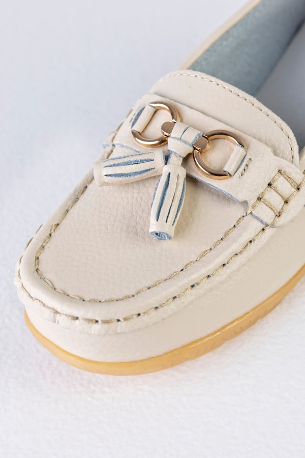 Mocassins en cuir à pompons