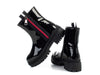 Boots with decorative zipper on side