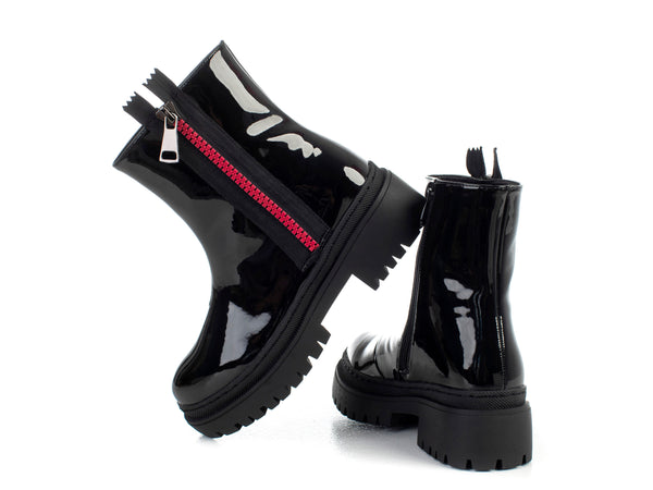 Boots with decorative zipper on side