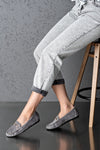 Moccasins with buckle