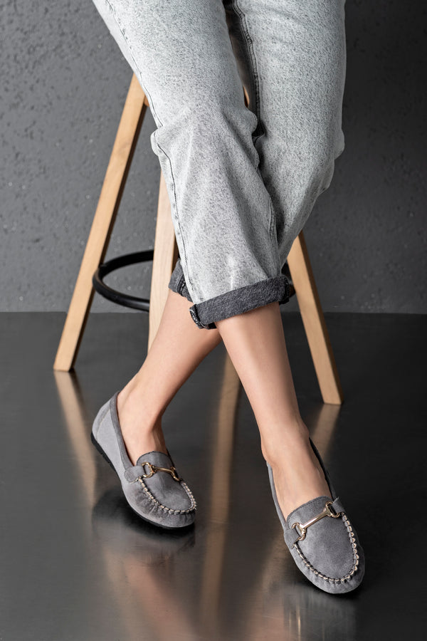 Moccasins with buckle