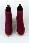 Leather boots with elastic at sides