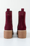 Leather boots with elastic at sides