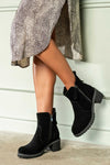Leather boots with decorative zipper on side