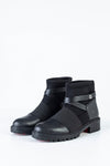 Boots with strap deccoration