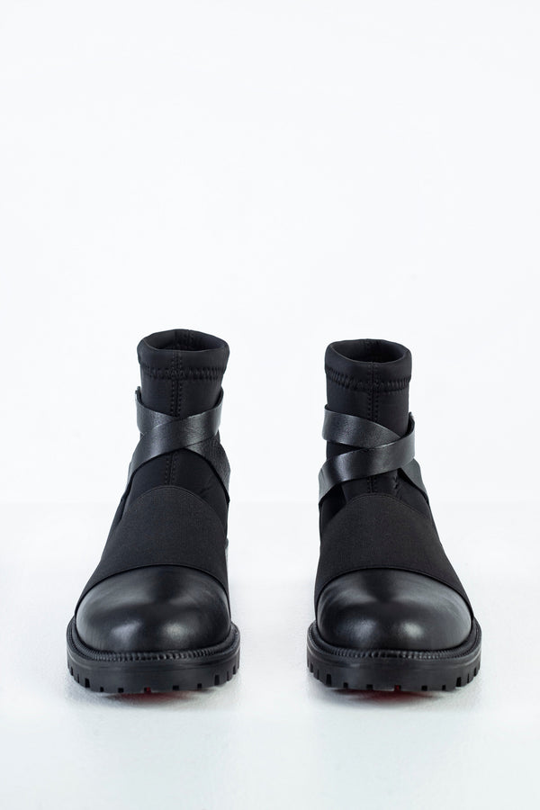 Boots with strap deccoration