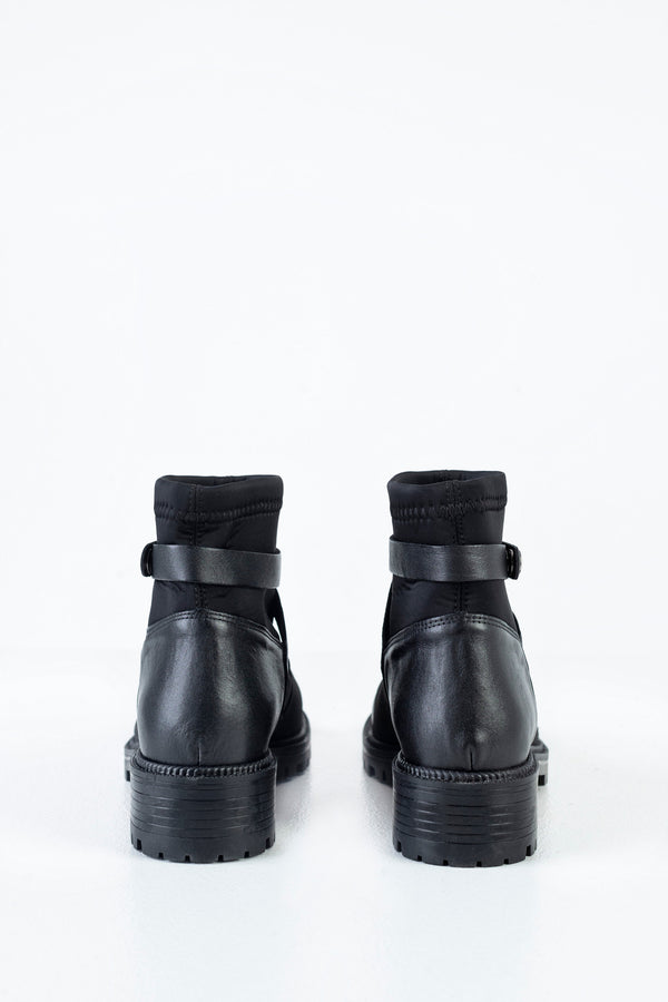 Boots with strap deccoration