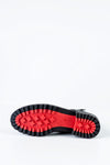 Boots with strap deccoration