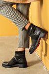 Boots with strap deccoration