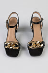 Heeled sandals with chain