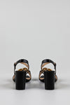Heeled sandals with chain