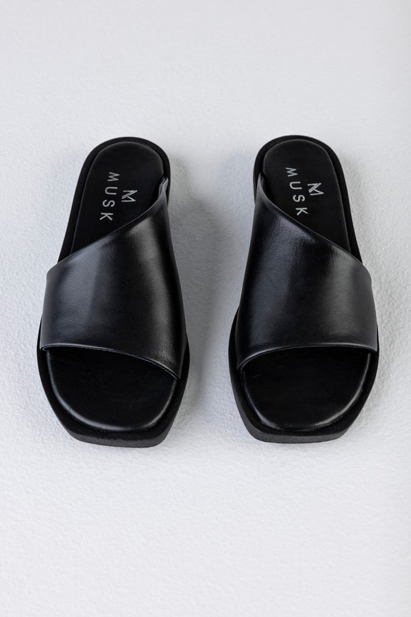 Leather asymmetrical slide sandals