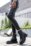 Lace-up boots with buckle