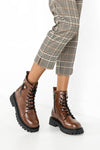 Lace-up boots with buckle