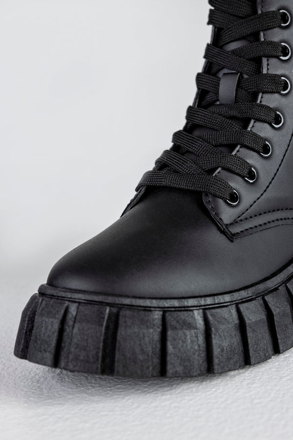 Lace up sneaker boots