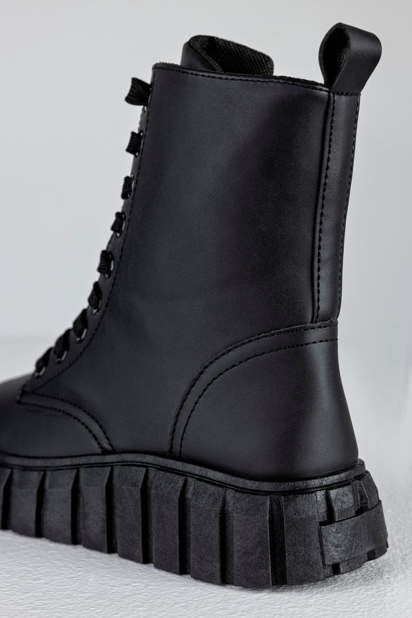 Lace up sneaker boots