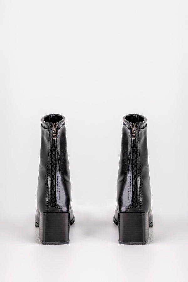 Zip back fastening boots