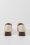 Heeled loafers with chain