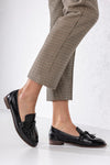 Loafers with tassels