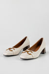 Heeled loafers with chain