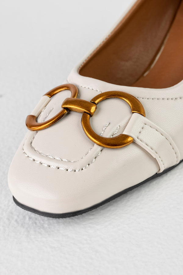 Heeled loafers with chain