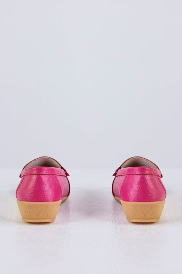 Mocassins en cuir à pompons