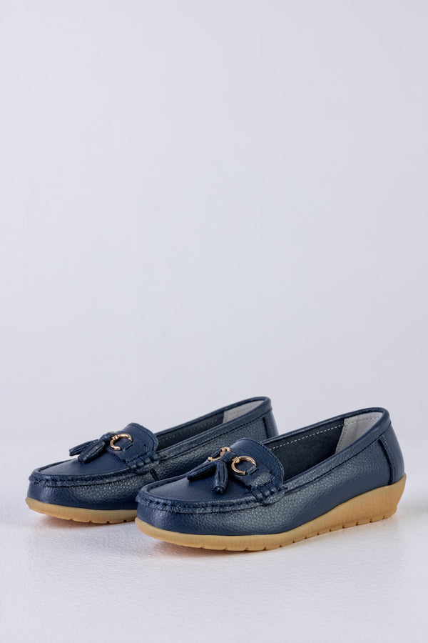 Leather moccasins with tassels