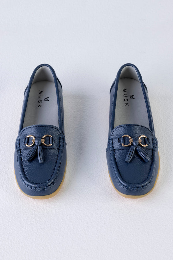 Leather moccasins with tassels