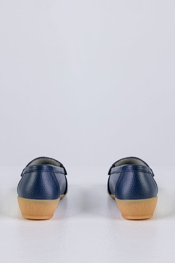 Leather moccasins with tassels