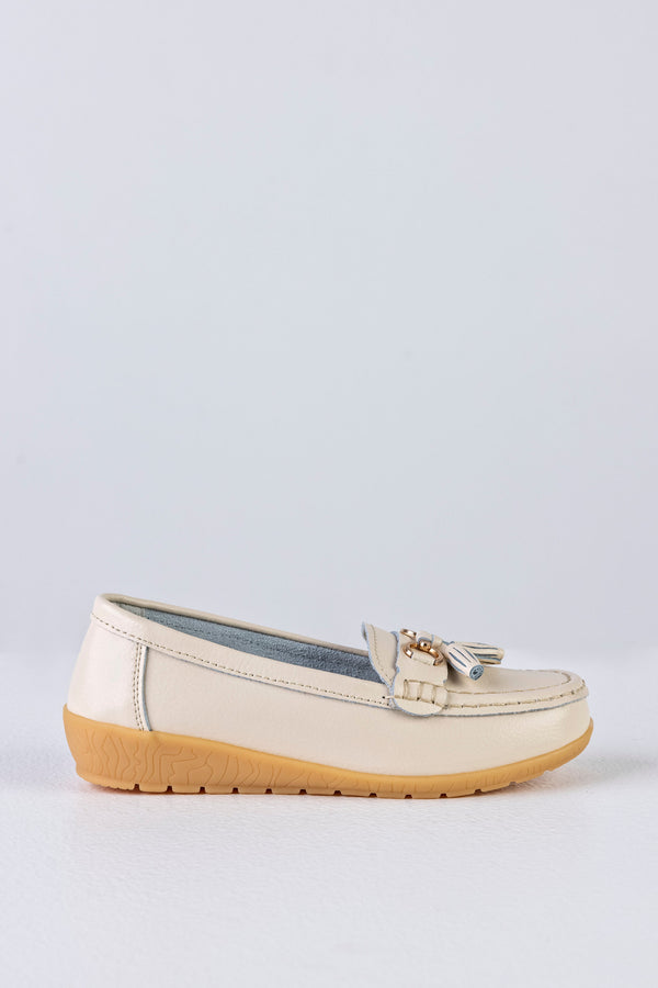 Mocassins en cuir à pompons