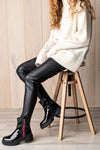 Boots with decorative zipper on side
