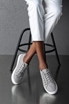 Lace-up, flat sole shoes
