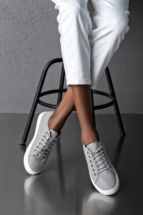 Lace-up, flat sole shoes