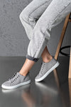 Lace-up, flat sole shoes