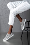 Lace-up, flat sole shoes