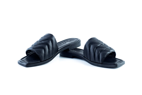 Sandales plates en cuir matelassé