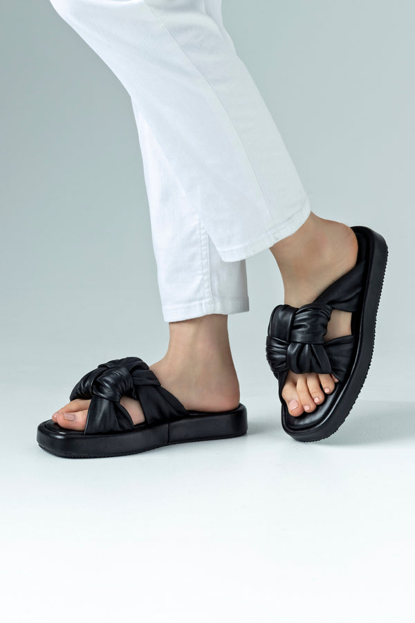 Sandales en cuir à plateforme.