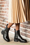 Lace-up, woven look boots