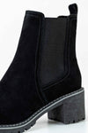 Leather boots with elastic at sides