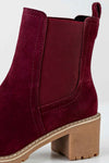 Leather boots with elastic at sides