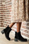 Leather boots with decorative zipper on side