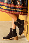 Leather boots with decorative zipper on side