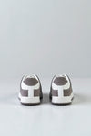 Lace-up fastening sneakers