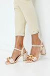 Heeled sandals with chain
